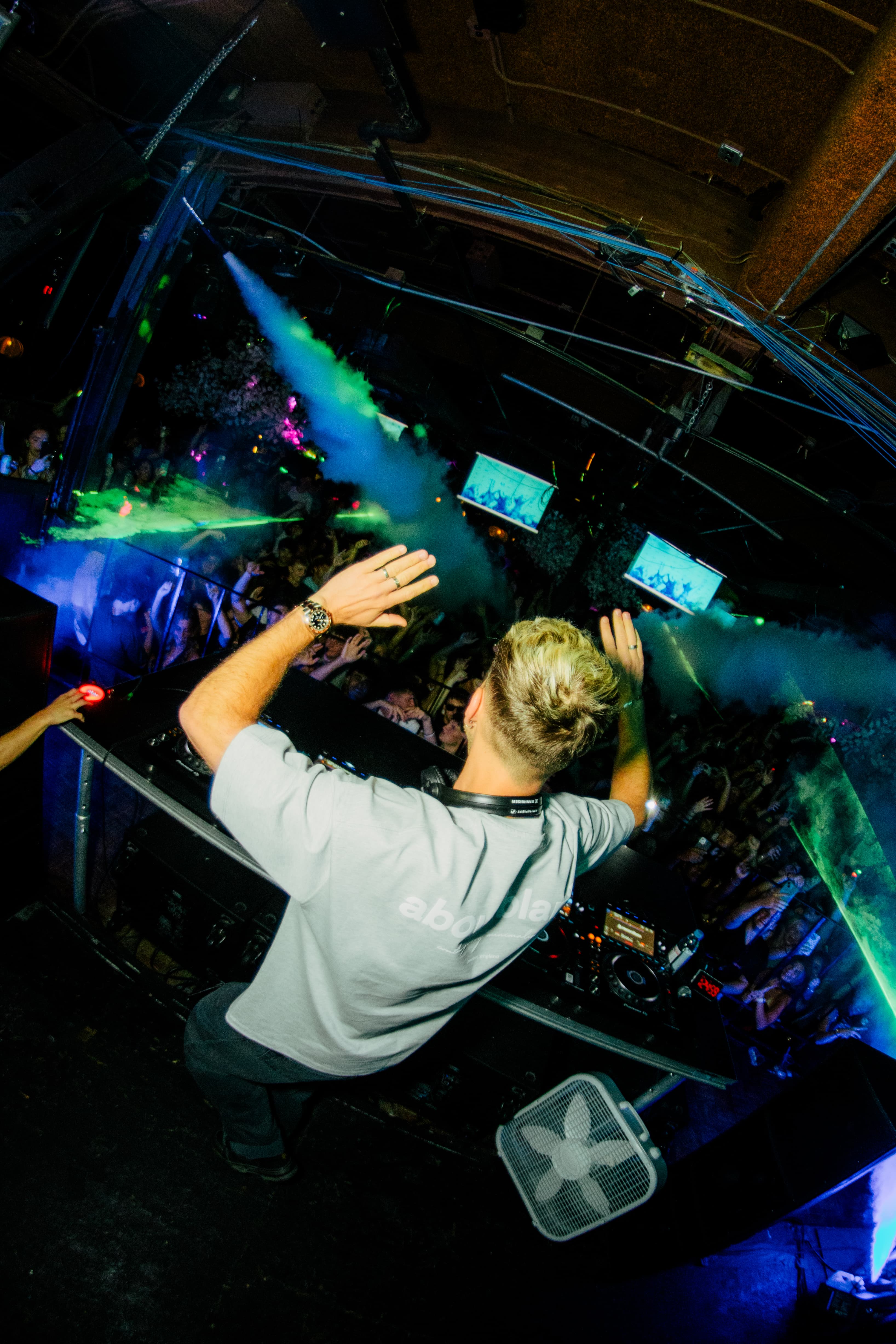 Club Rush nightclub at Harper's East Lansing  packed dance floor, fog cannons, concert lighting